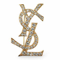 Yves Saint Laurent Saint Laurent pin brooch, badge, SAINT LAURENT monogram YSL, rhinestone, gold — Like New