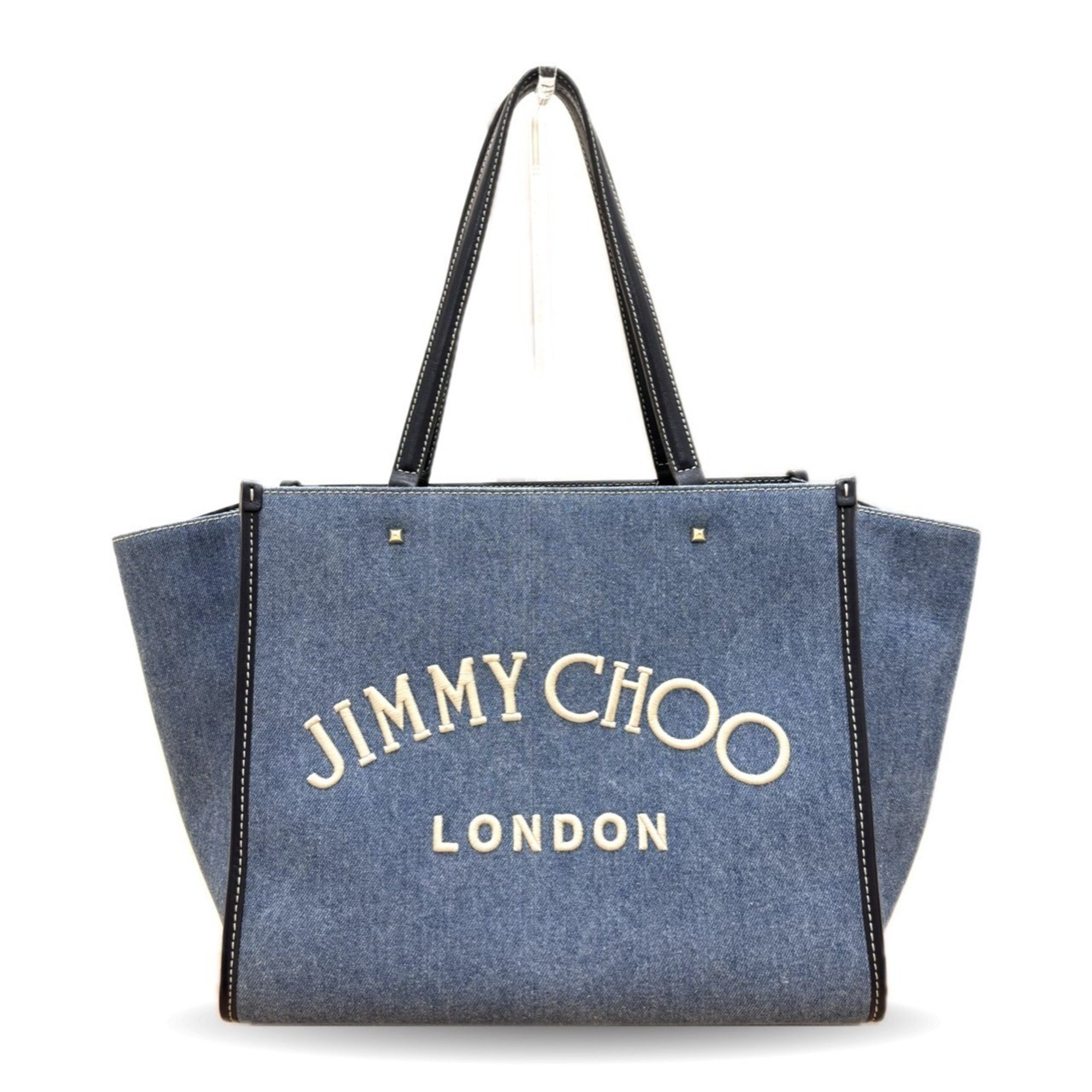 Jimmy Choo Varenne denim tote bag with embroidery and studs in indigo blue.