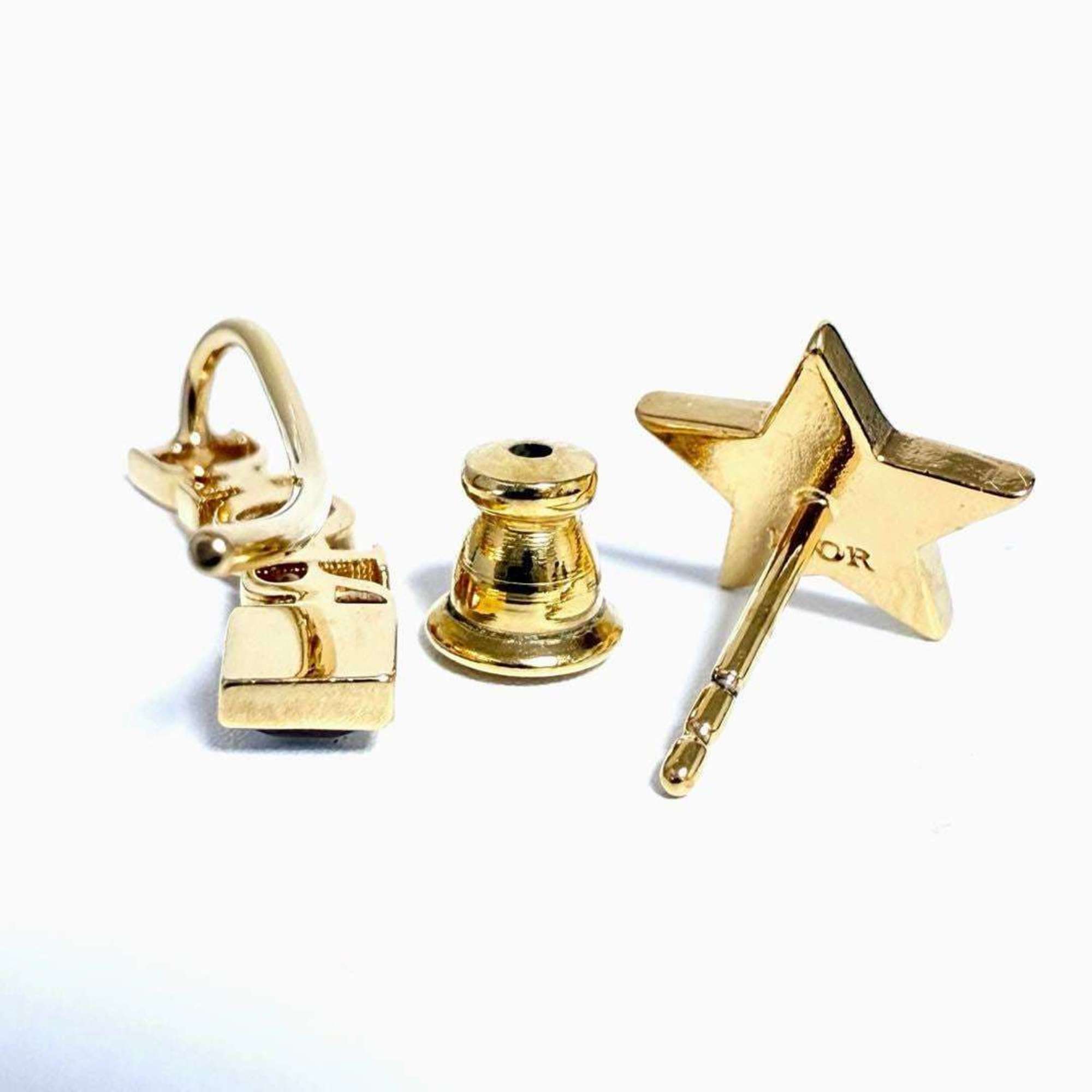 Christian Dior Dior Asymmetric Revolution Earrings Star — Like New