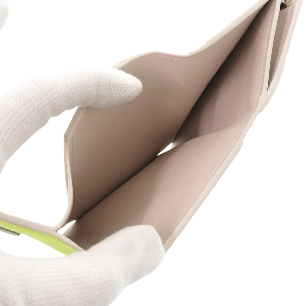 Like new Louis Vuitton Portefeuille Capucines XS M80325 Taurillon Leather Yellow and Beige Tri-fold Wallet LV 0725