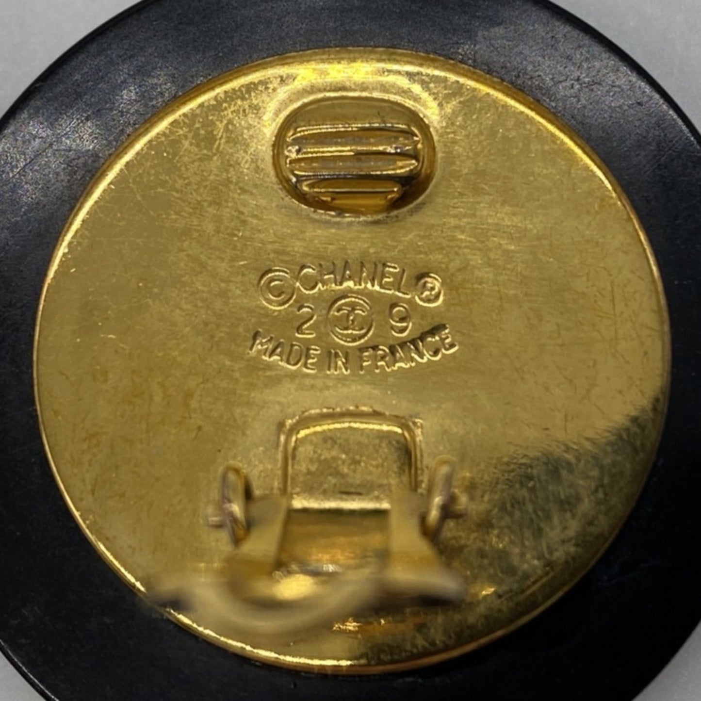 CHANEL Matelasse Coco Mark Earrings in Black and Gold