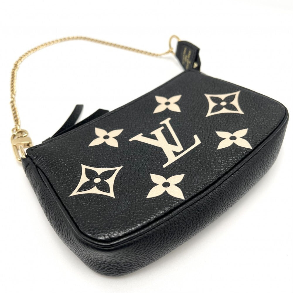 Louis Vuitton Women's Mini Pochette Accessoires Bicolor Accessory Pouch LOUIS VUITTON M80732 Monogram Empreinte Black with Gold Hardware — Like New