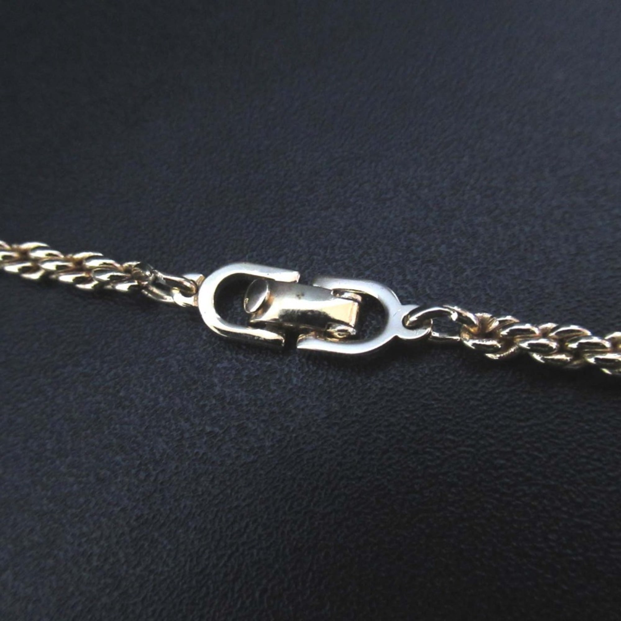 Vintage Christian Dior logo long necklace in gold.