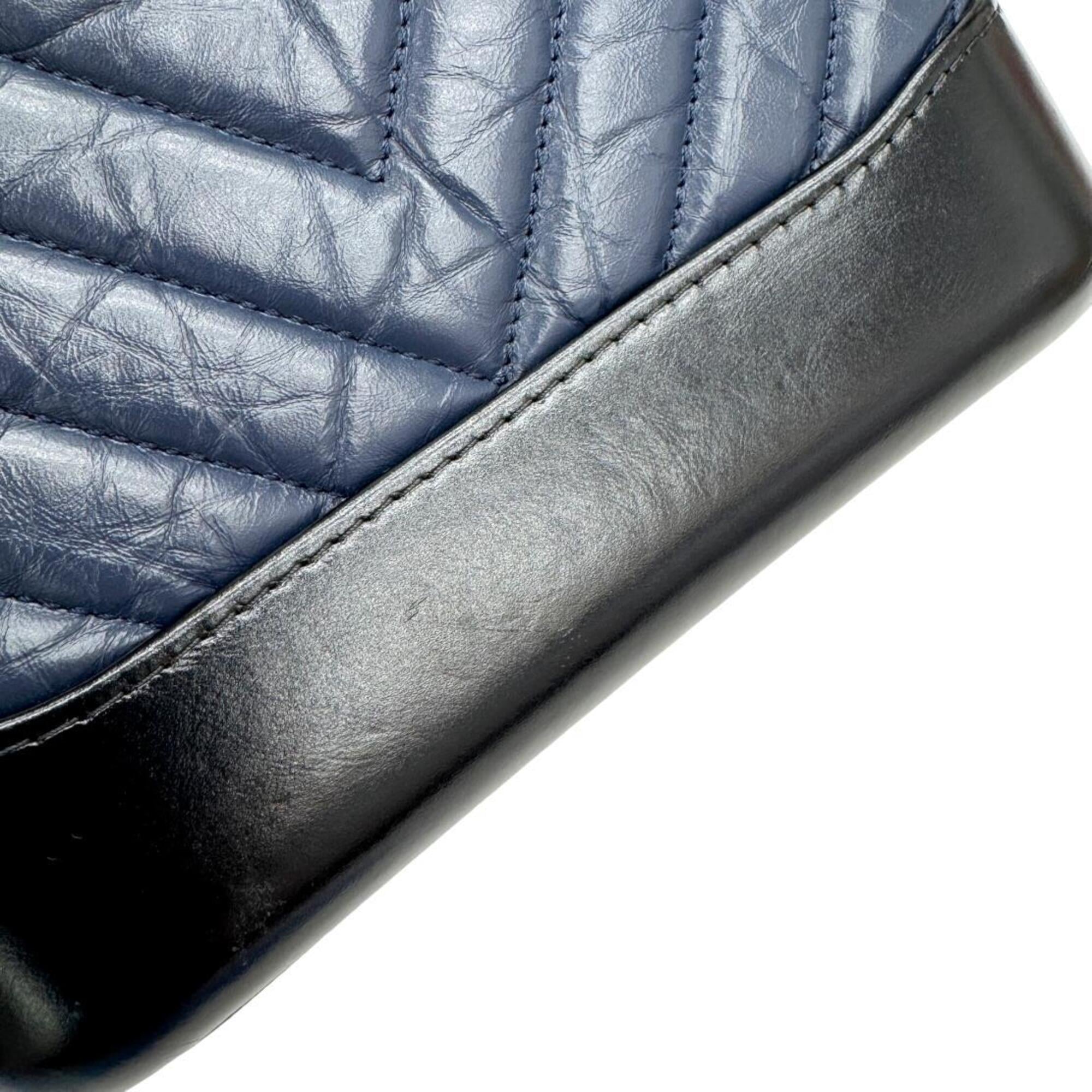 CHANEL Gabrielle de Small Hobo V-stitch Chevron Calfskin Shoulder Bag for Women (Navy/Black) — New - Store Return