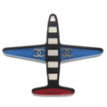 Excellent condition Chanel airplane Coco mark plastic brooch in blue, black, white, and red. 1361