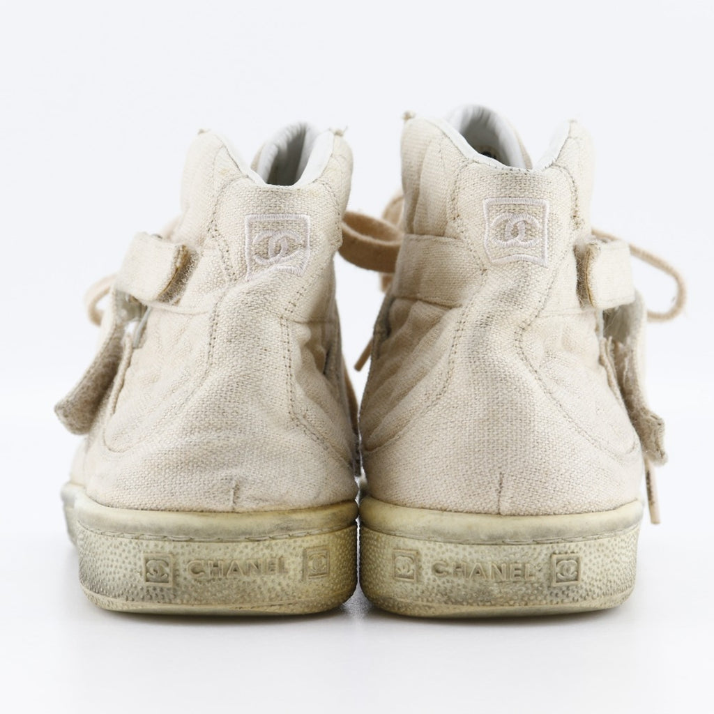 CHANEL High-top sneakers Matelasse