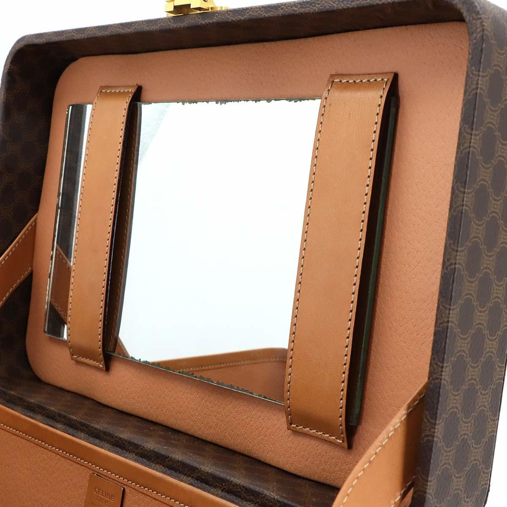 Celine Macadam Vanity 2-way hand/shoulder bag in brown PVC leather with gold hardware.