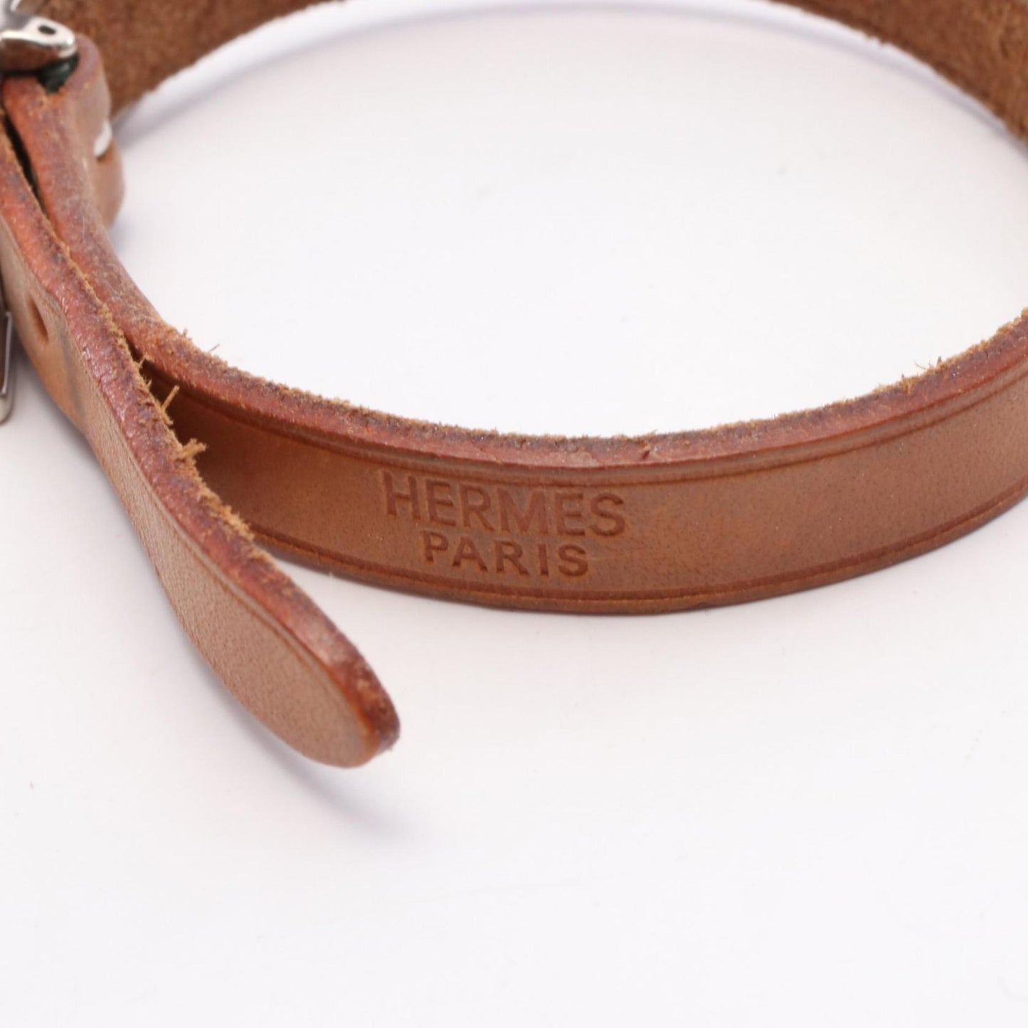 Hermes Hermès API 1 bracelet, stainless steel and leather, available in silver brown.