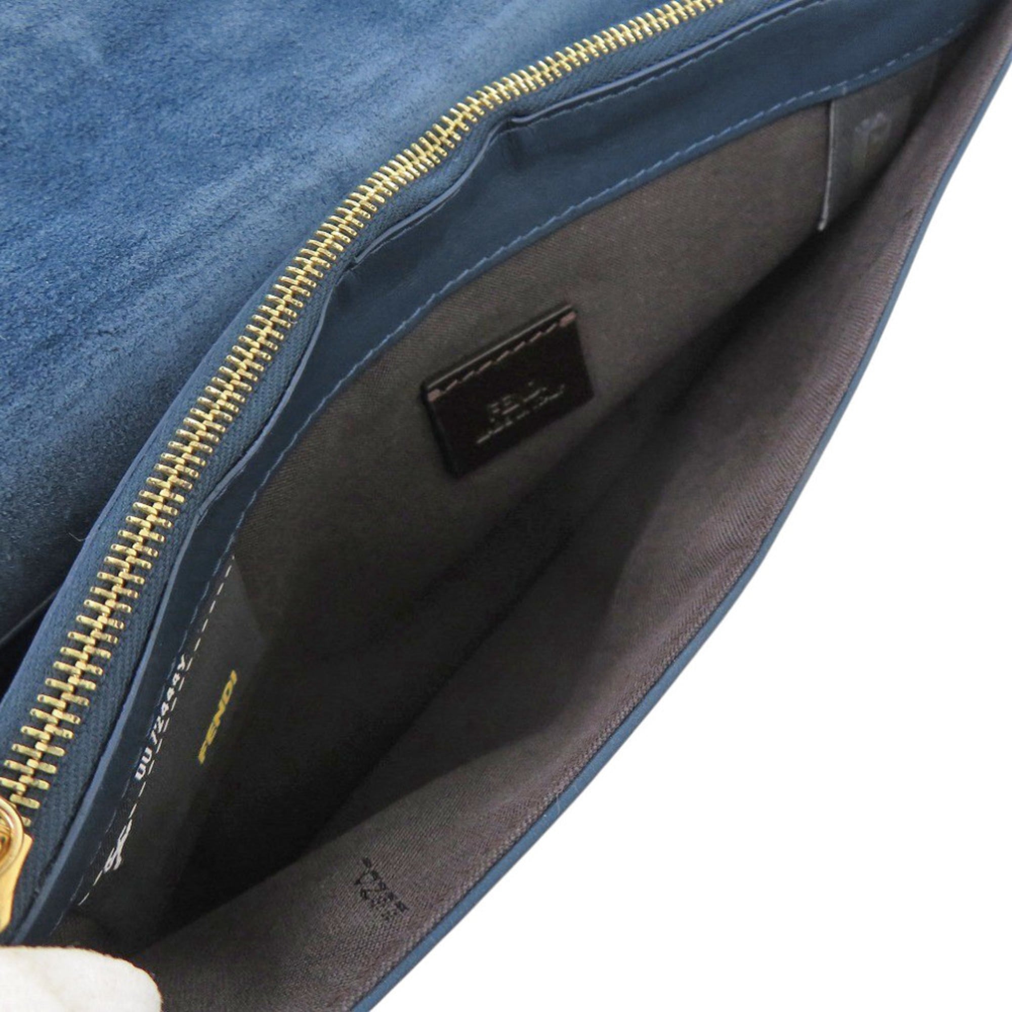 Excellent condition Fendi Pecan pattern clutch bag 8M0284 in leather and canvas, blue brown. 0475FENDI