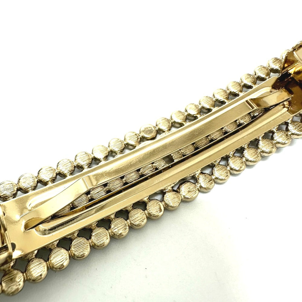 Chanel logo hair accessory Valletta Gold — Like New