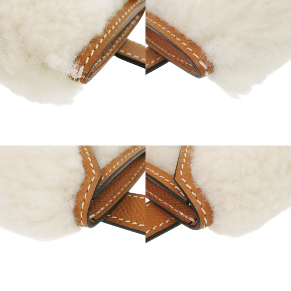 Hermes Kelly Pocket Teddy, Veau Epsom leather, wool, gold hardware, K stamp (made in 2025), waist bag, 0223HERMES — New - Store Return