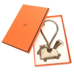 Hermes Robeo Plush PM, Veau Swift shearling, Anion beige, Malfa, Clé Terre, Ecru, K stamp (2025 production), accessory, bag charm, 0478 HERMES Rodeo PM — New - Store Return