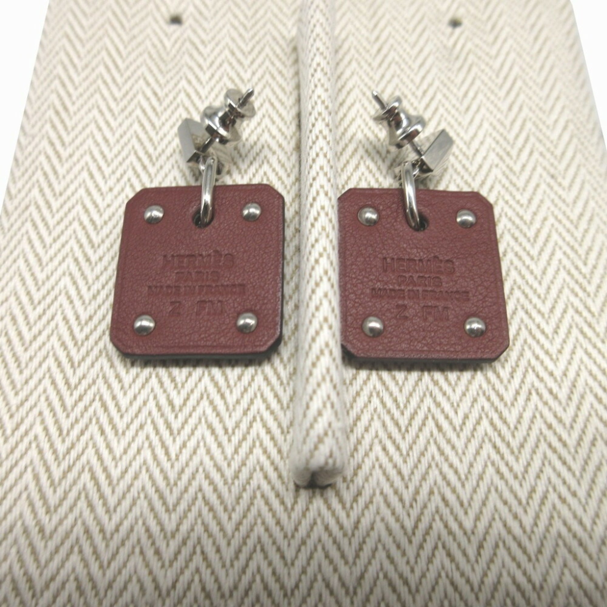 Hermes Asdukur Z engraved heart leather metal brown silver earrings 1256HERMES — Like New