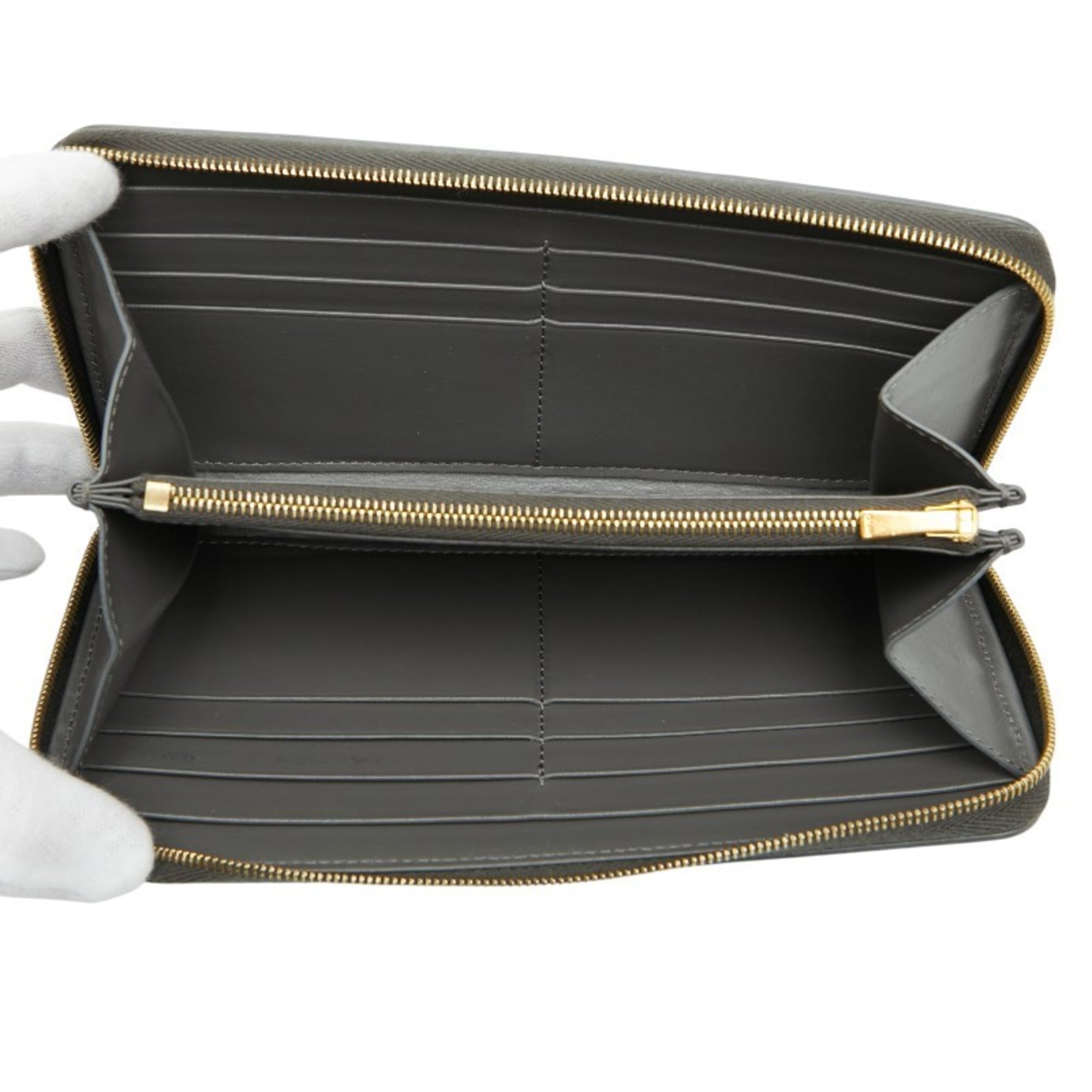 Celine round zipper long wallet in gray leather for women.