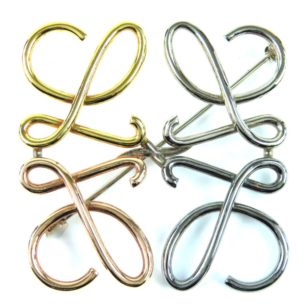 LOEWE Anagram Brooch in 4 Colors: Gold, Silver, Bronze. Comes with dust bag. Highly popular and recommended for women — Like New