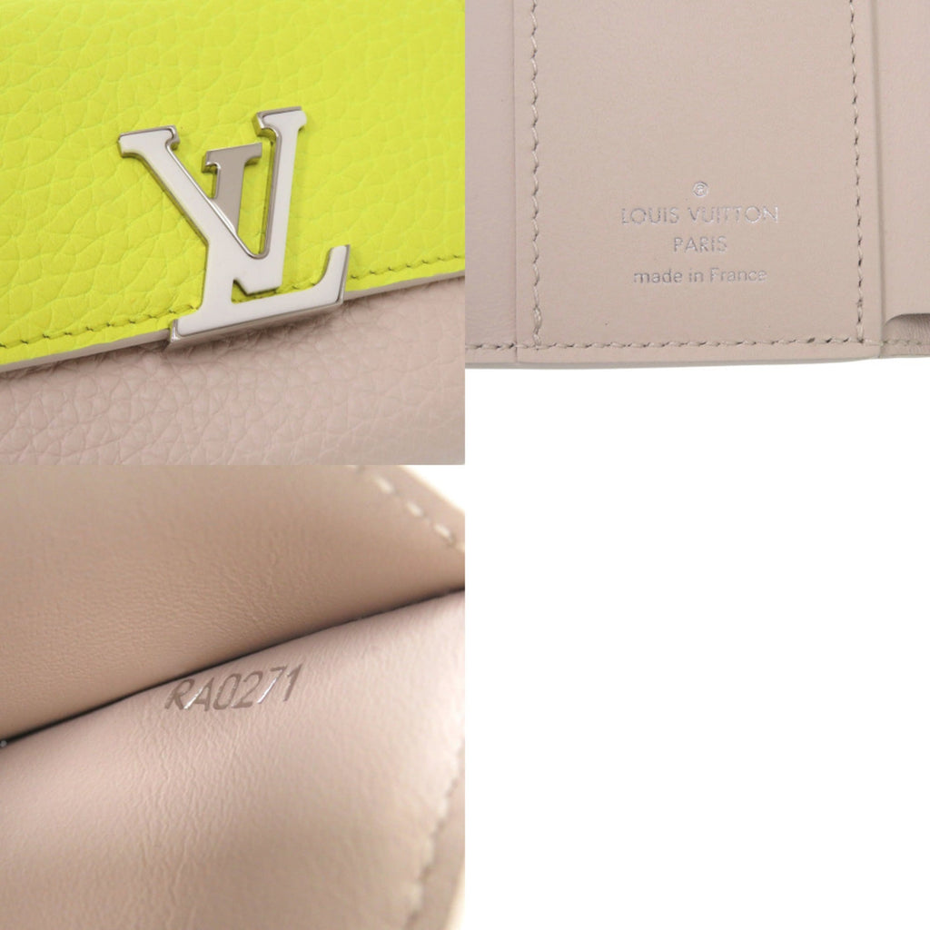Like new Louis Vuitton Portefeuille Capucines XS M80325 Taurillon Leather Yellow and Beige Tri-fold Wallet LV 0725