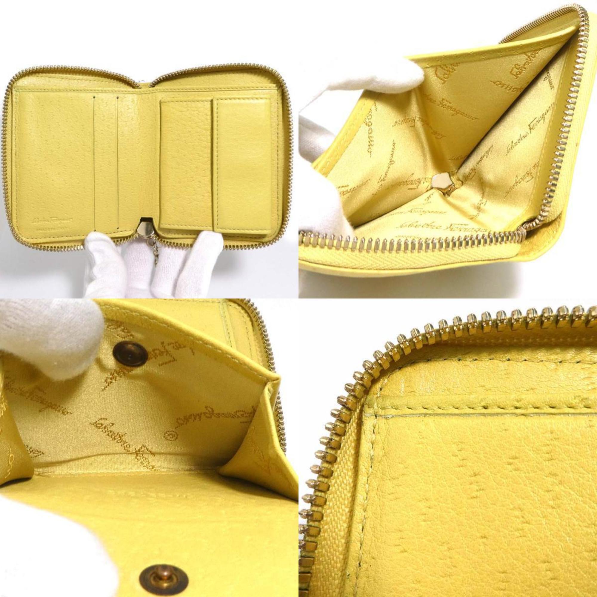 Salvatore Ferragamo Gancini Leather Bi-fold Wallet in Mustard Yellow for Women (h31855a)