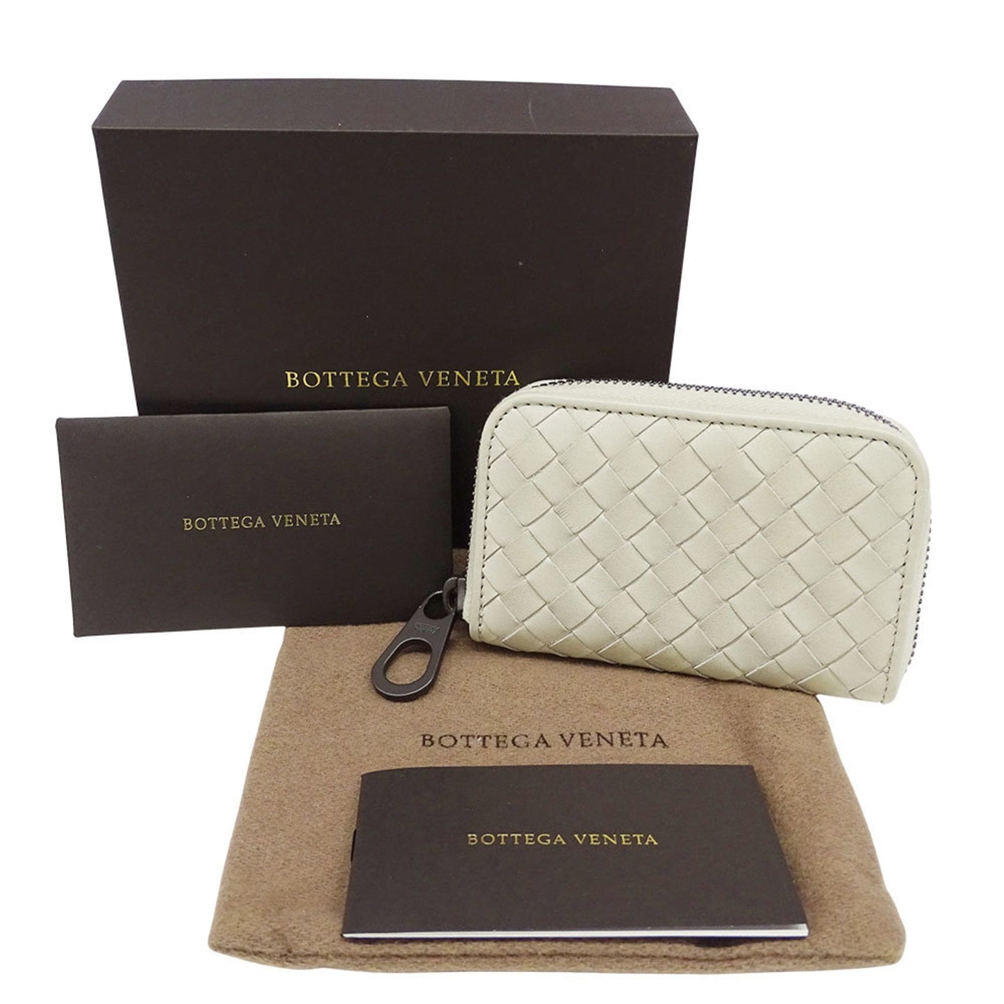 Bottega Veneta wallets for men and women, branded intrecciato leather coin cases, white with a round zipper woven purse.