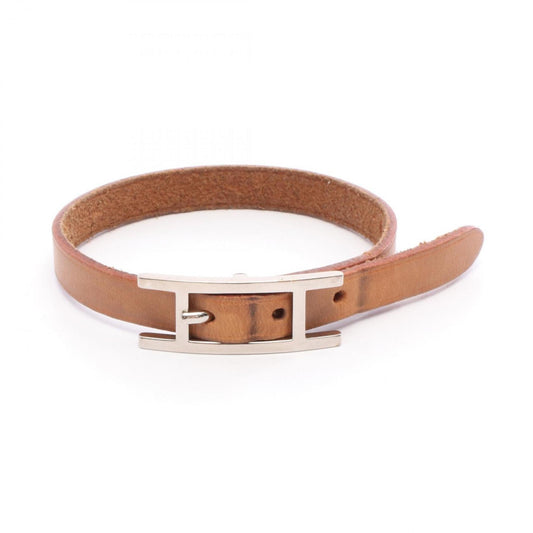 Hermes Hermès API 1 bracelet, stainless steel and leather, available in silver brown.