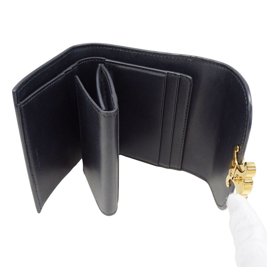 Celine Women's Triomphe Tri-fold Wallet in Shiny Calfskin. Compact, simple design.