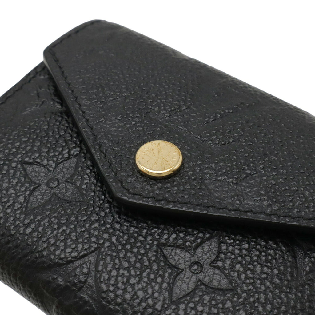 LOUIS VUITTON Monogram Empreinte Portefeuille Zoe Tri-fold Wallet in Black (Noir) M62935