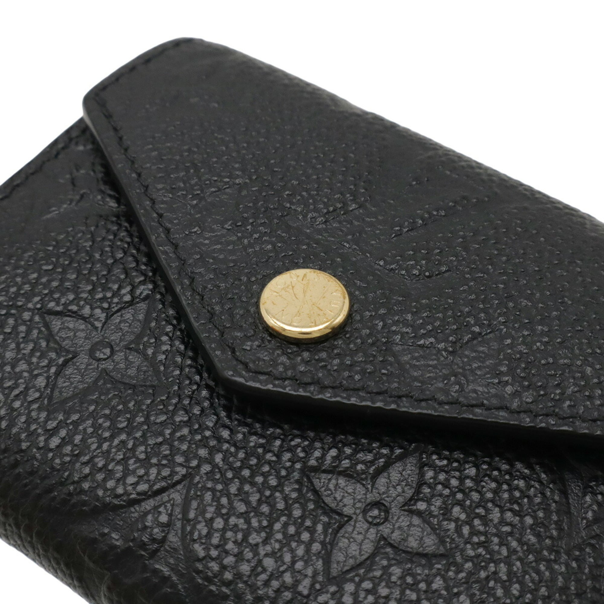 LOUIS VUITTON Monogram Empreinte Portefeuille Zoe Tri-fold Wallet in Black (Noir) M62935