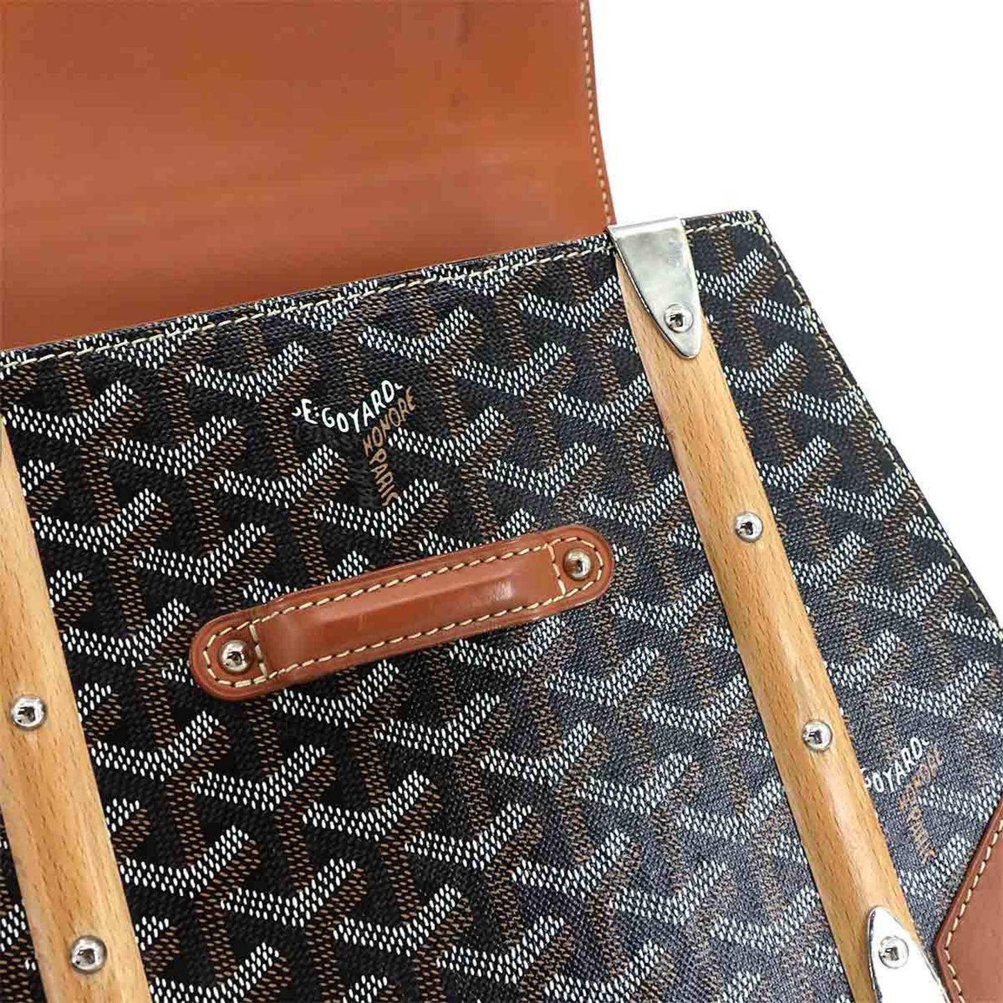 Goyard Saigon PM 2-way hand/shoulder bag in PVC, leather, wood, black, brown, and herringbone.