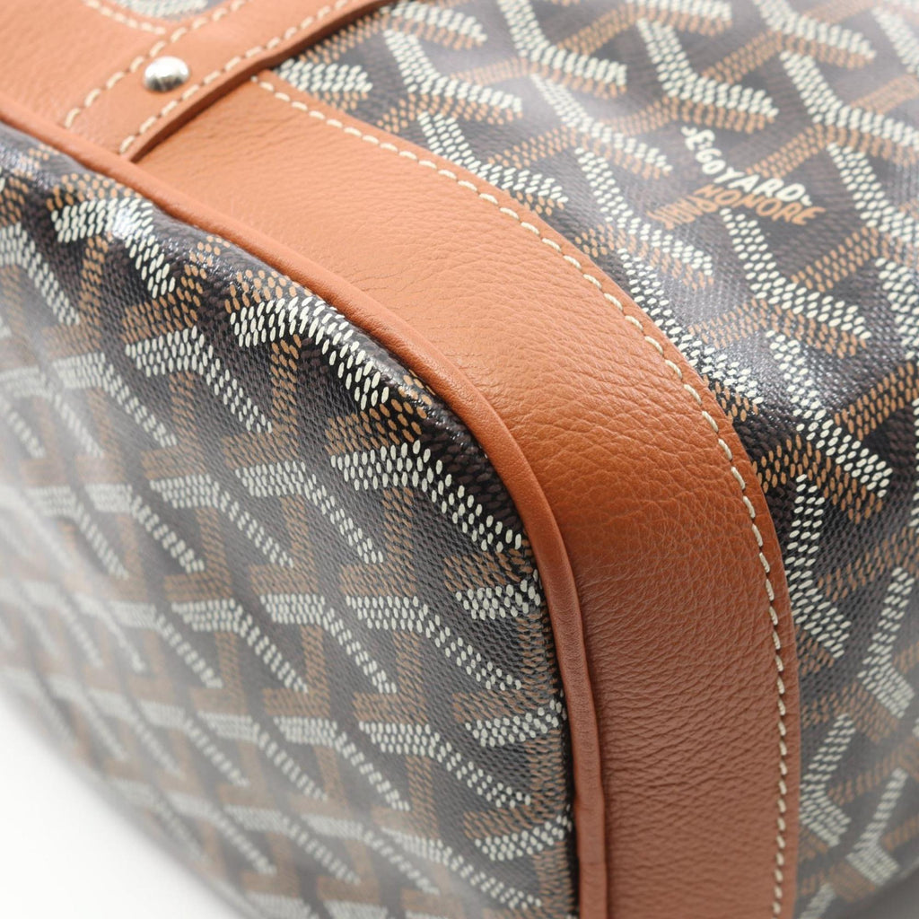 Goyard Petit Flo shoulder bag in coated canvas and leather. Available black, brown, multicolor.