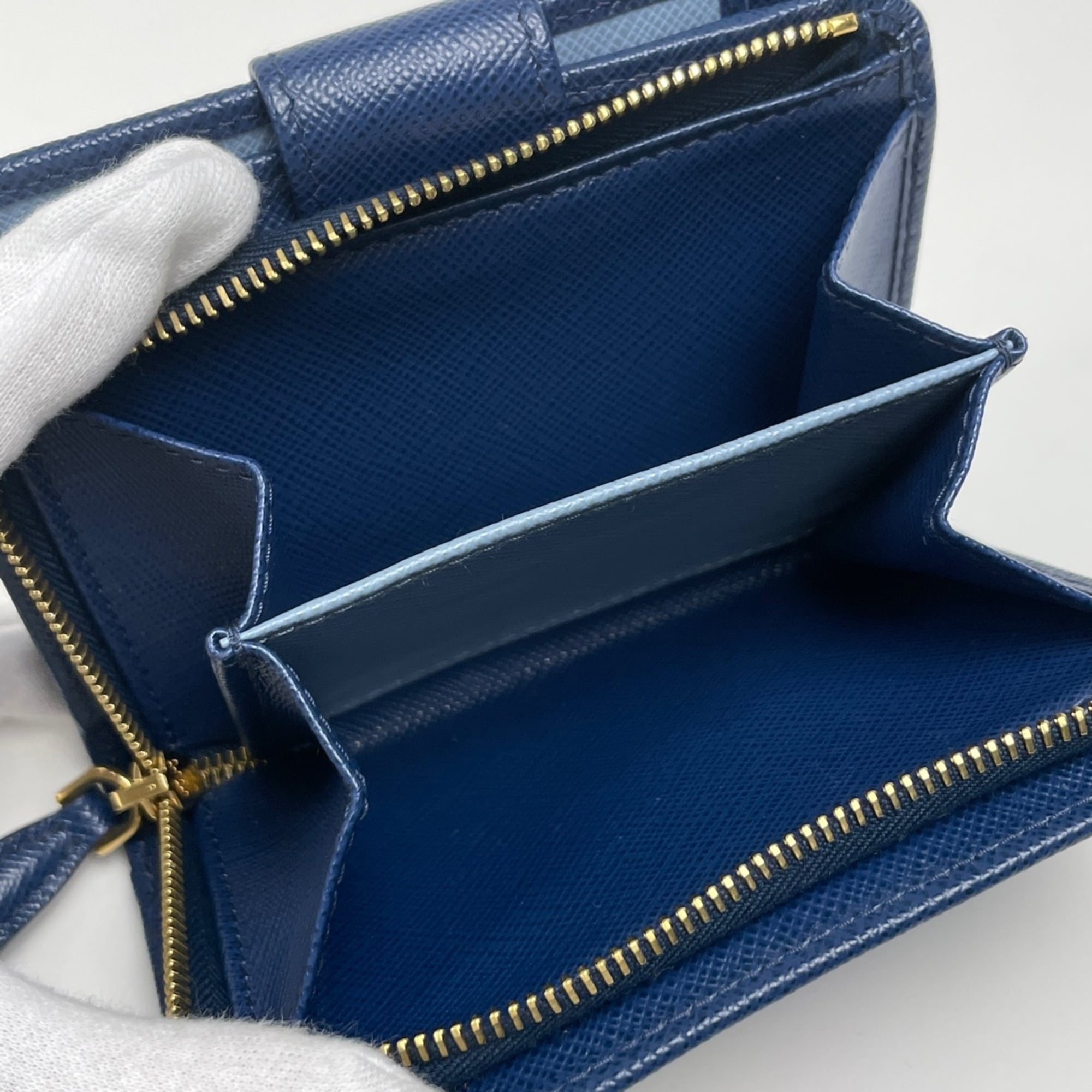 Prada logo bifold wallet with bill compartment and coin purse, Saffiano leather, blue, for women