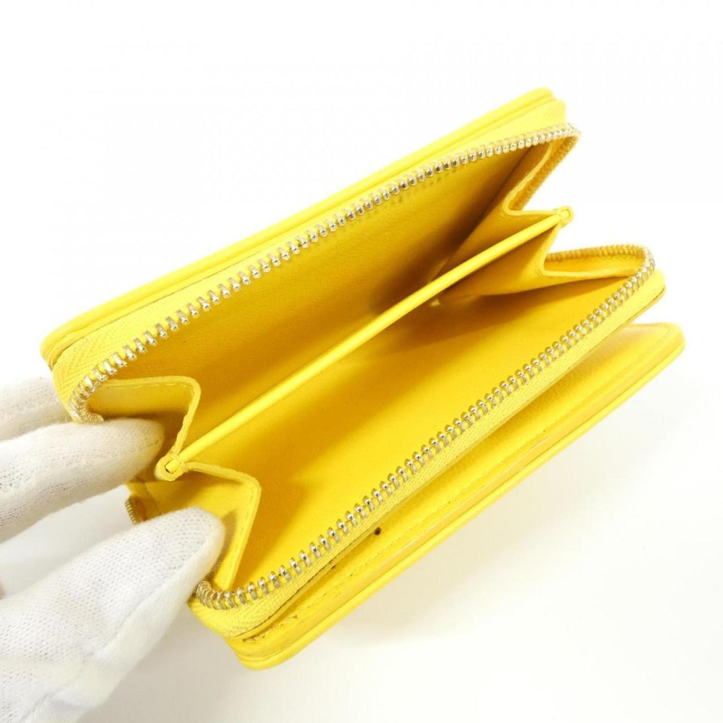 Louis Vuitton Coussin (Super Lucky Day) Portefeuille Lou M13792 Wallet