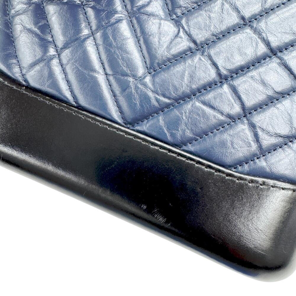 CHANEL Gabrielle de Small Hobo V-stitch Chevron Calfskin Shoulder Bag for Women (Navy/Black) — New - Store Return