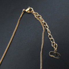 Vintage Christian Dior logo chain necklace pendant in GP gold for women — Like New