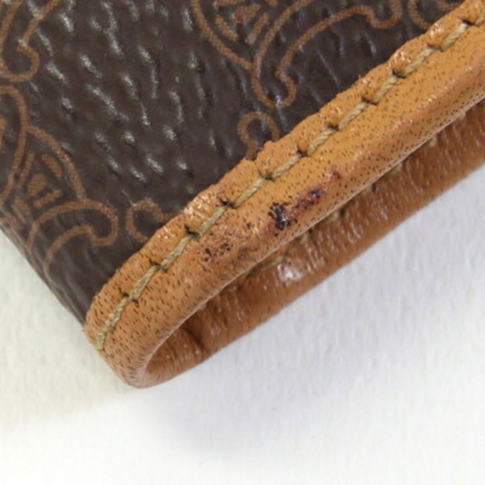 Celine bifold wallet in macadam, dark brown, beige, PVC, and leather. Compact wallet/mini wallet. For older women.