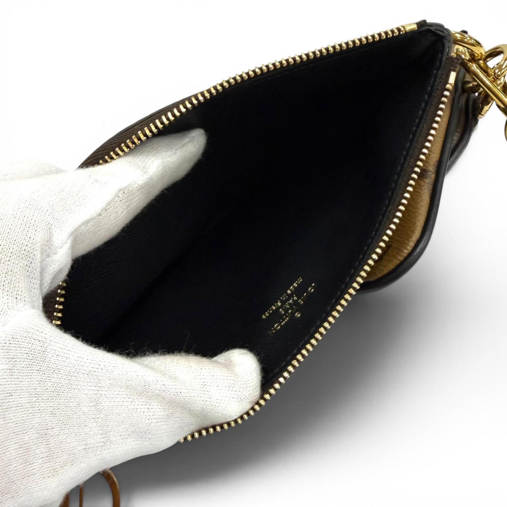 LOUIS VUITTON M68756 Monogram Giant Reverse Leather Pochette Trio Brown Made in France Women's with Dust Bag — Like New