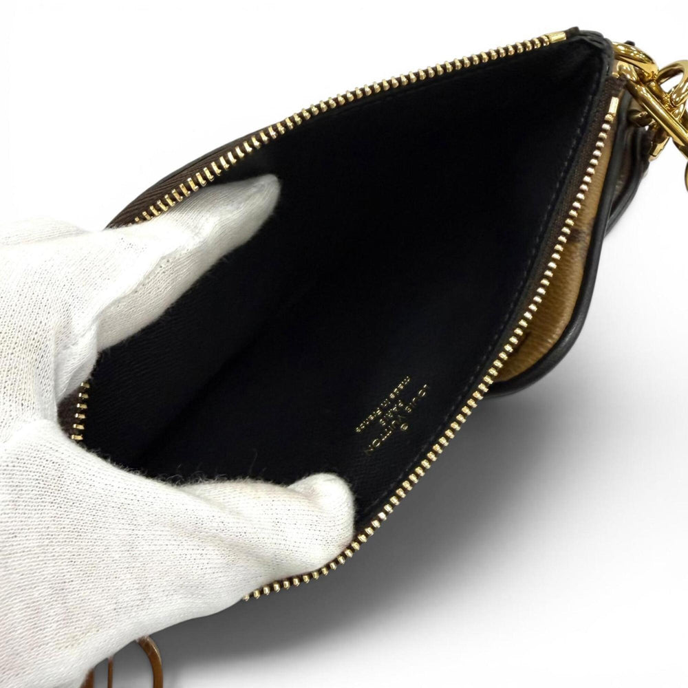 LOUIS VUITTON M68756 Monogram Giant Reverse Leather Pochette Trio Brown Made in France Women's with Dust Bag — Like New