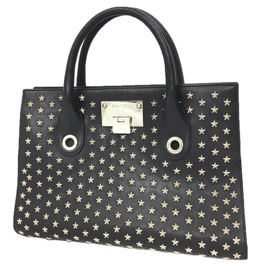 JIMMY CHOO Riley tote bag in black with star studs. This Jimmy Choo is perfect for women.