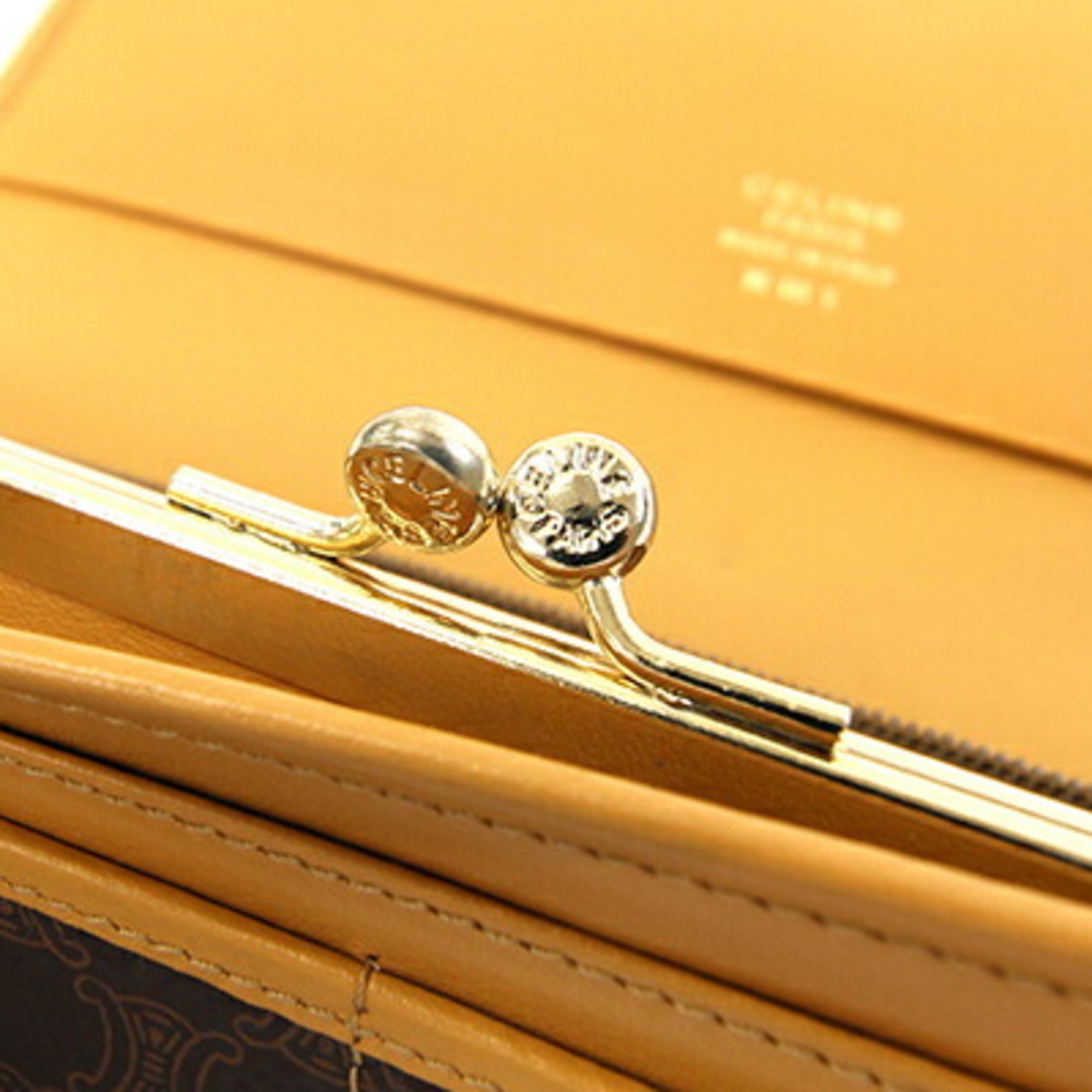 Celine bifold long wallet in macadam, dark brown, beige, PVC, and leather. Women's.