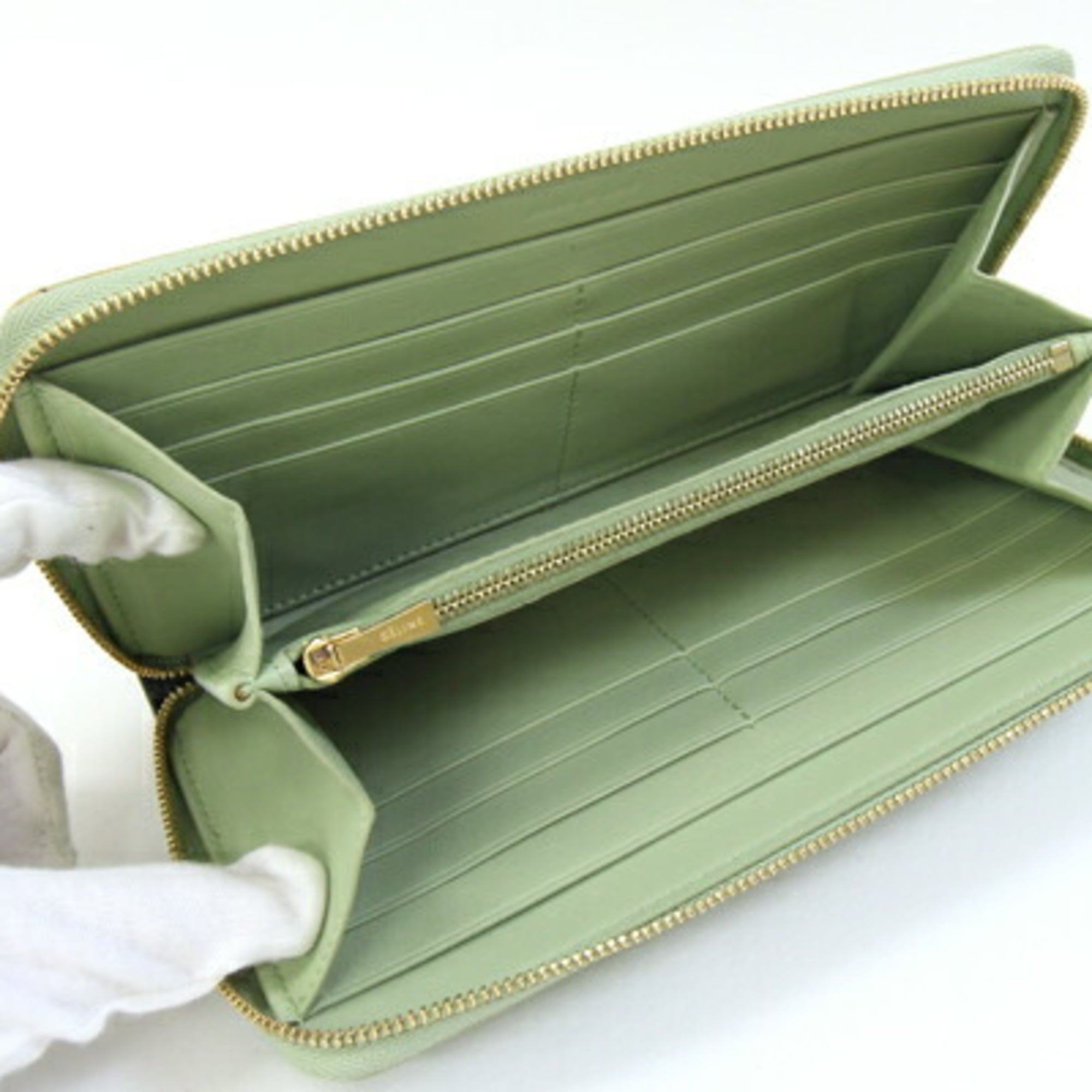 Celine round long wallet in light green and dark leather. Two-tone zip closure. Women's.