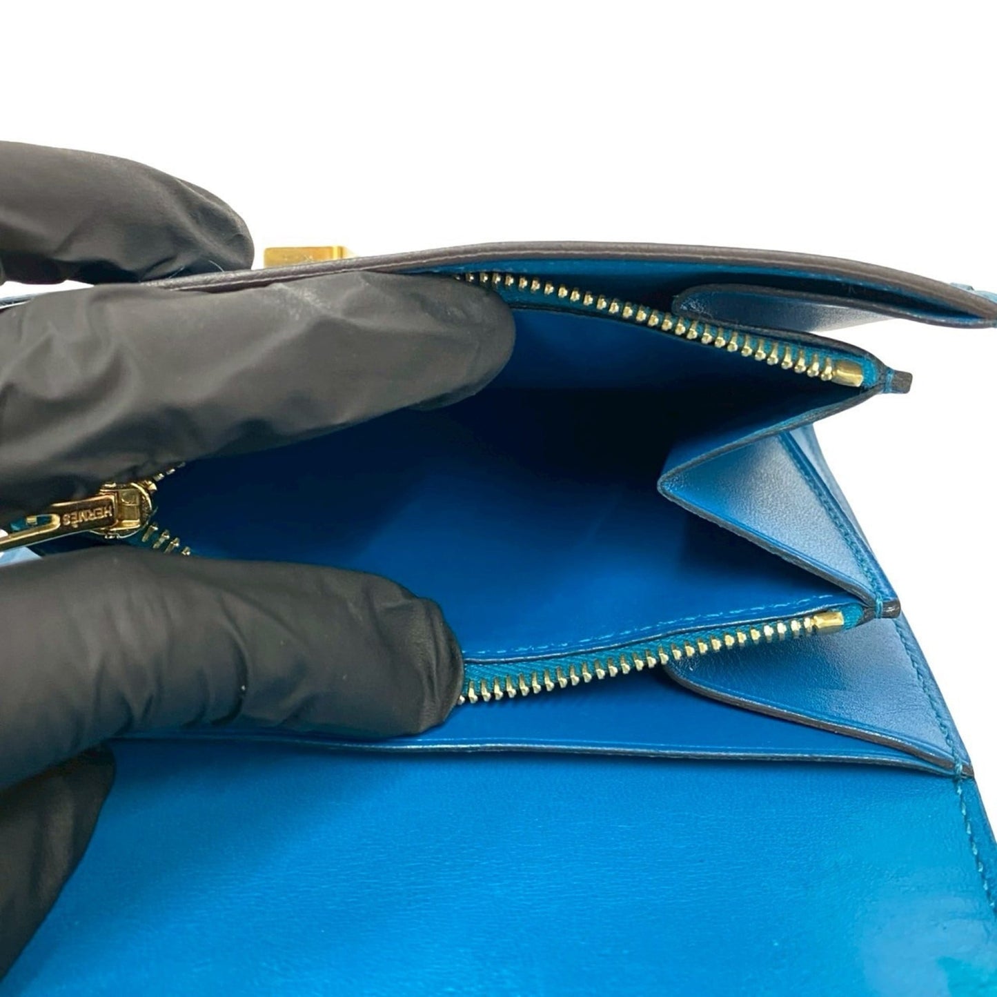 A stamped HERMES Constance Compact Calf Leather Bi-fold Wallet Blue 28793