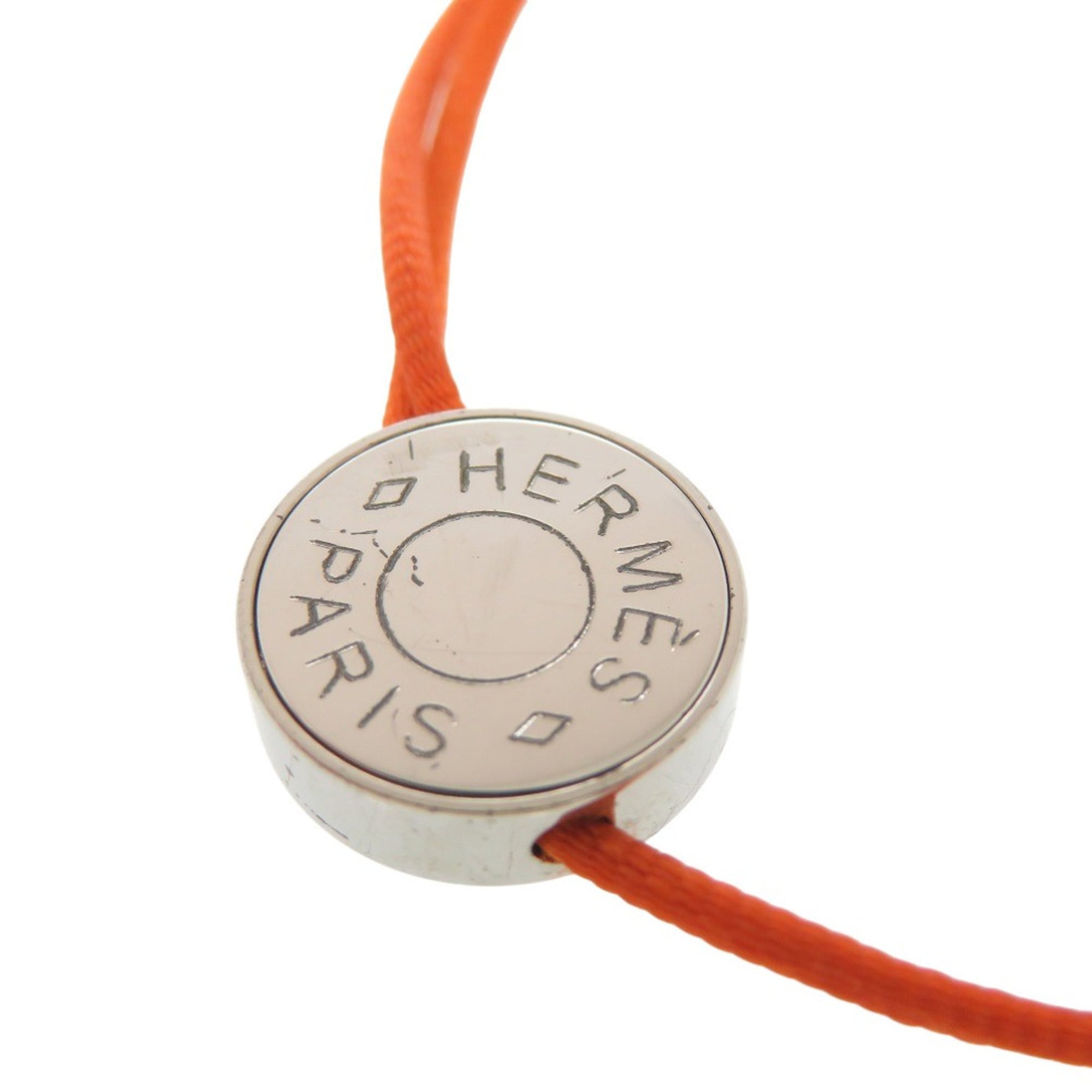 Excellent condition Hermes Serie cord bracelet in metal, orange, 0534