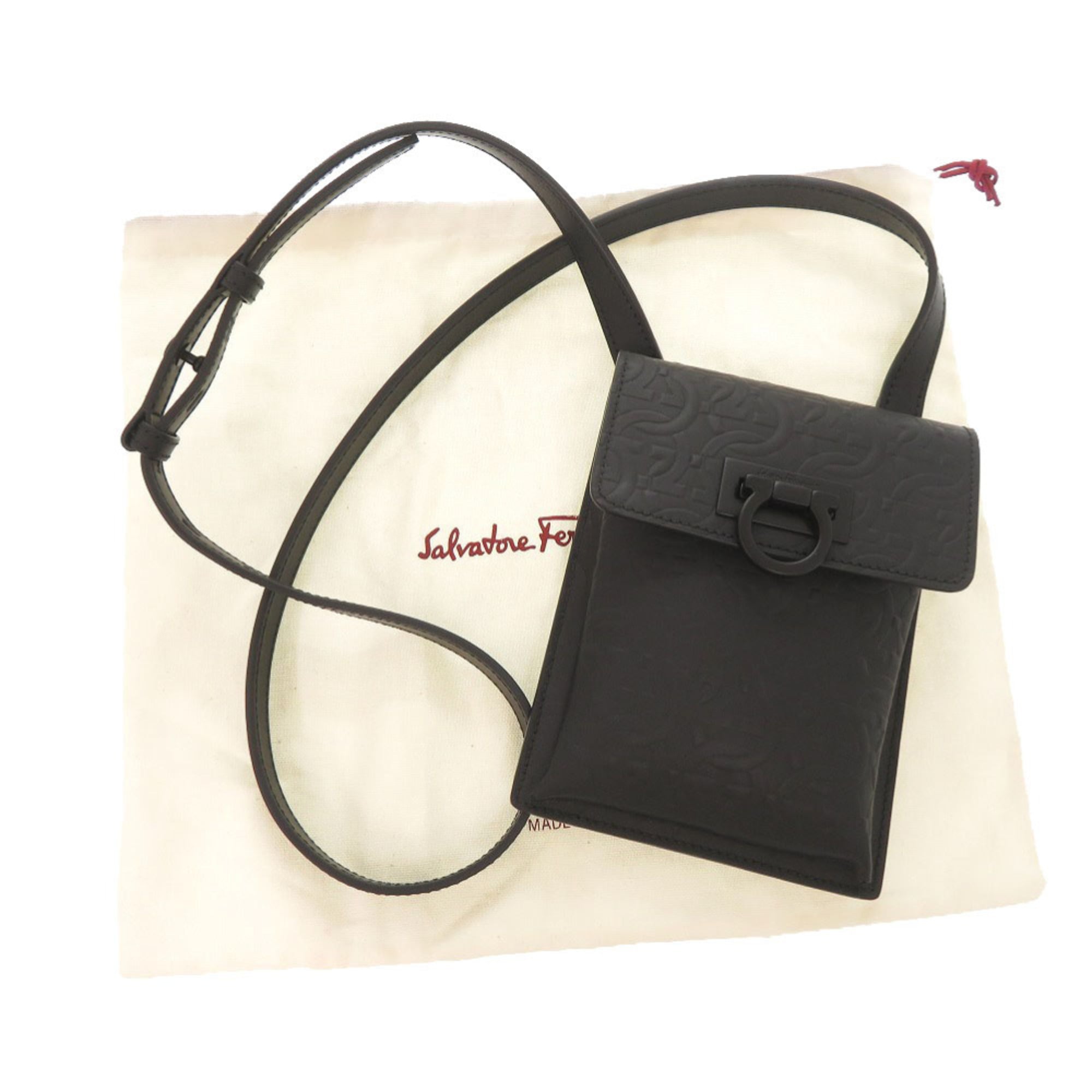Excellent condition Salvatore Ferragamo Gancini embossed leather black shoulder bag, 2036.