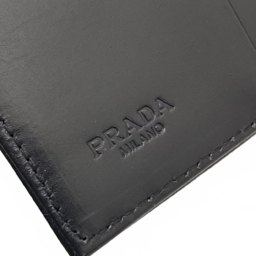 Prada Ribbon Triangle Trifold Wallet in Nylon and Leather, Black. Triangular Plate Compact Wallet, NERO MM-16119.