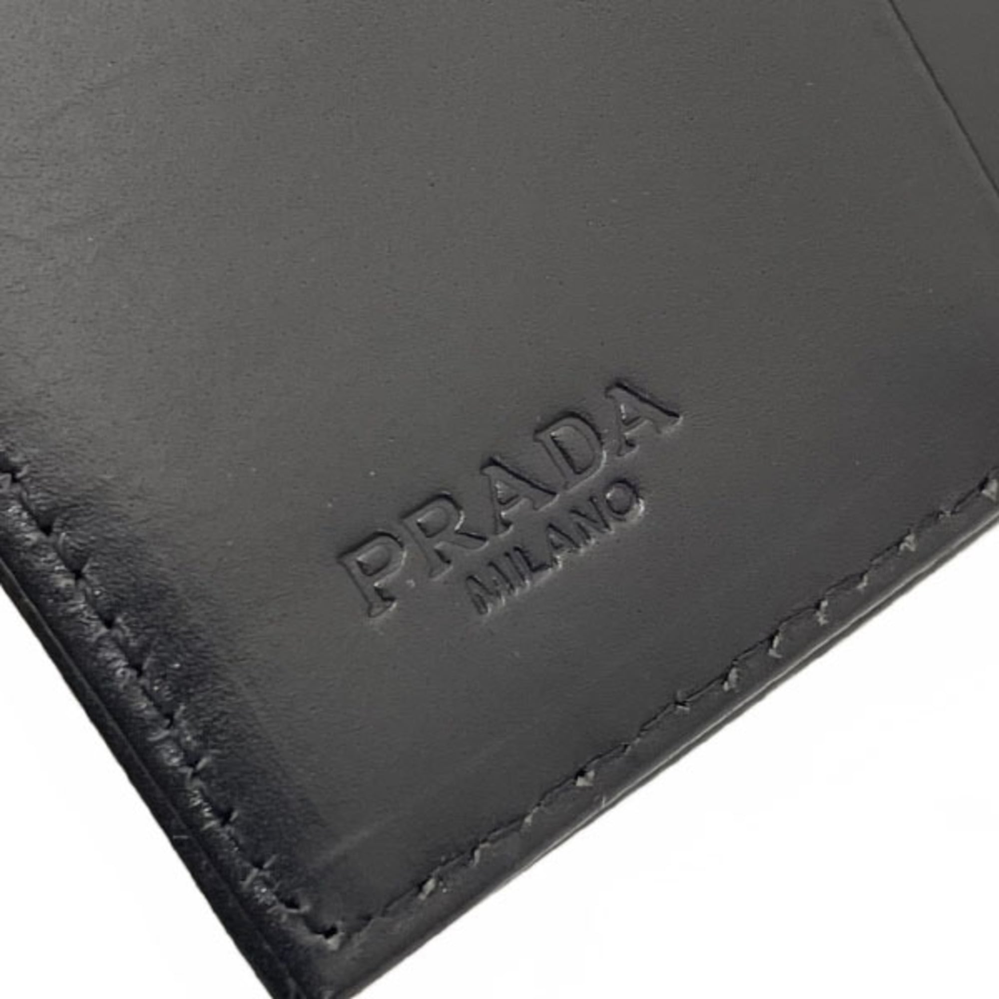 Prada Ribbon Triangle Trifold Wallet in Nylon and Leather, Black. Triangular Plate Compact Wallet, NERO MM-16119.