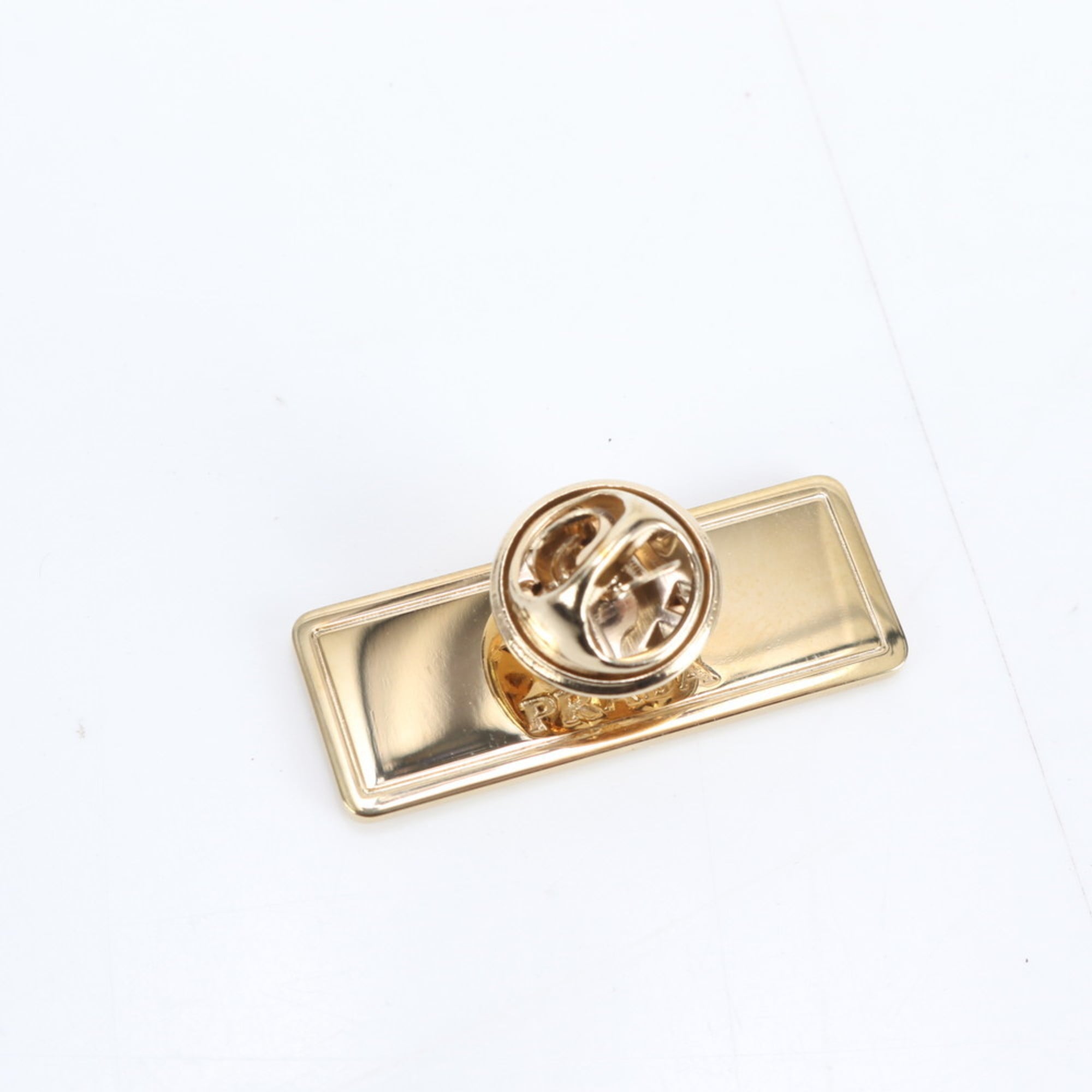 Prada pin badge brooch motif accessory for men