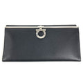 Salvatore Ferragamo Gancini logo long wallet in leather, black for men and women.