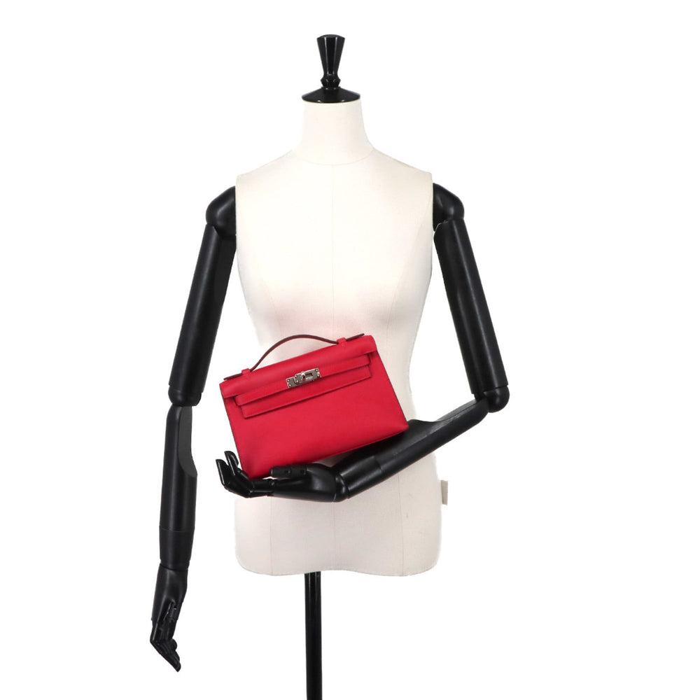 Hermes Pochette Kelly Swift Rouge Ladue Handbag, K stamp, Silver hardware — New - Store Return
