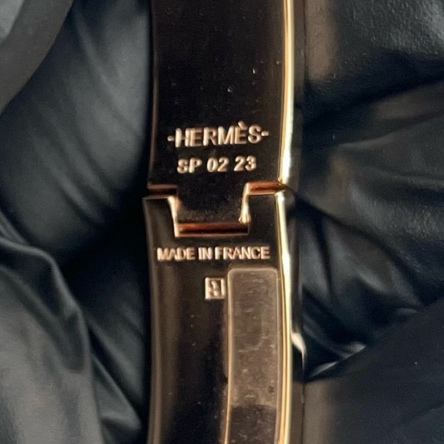 HERMES Click H Bracelet/Bangle Accessory for Women, Gold/Black, 28150