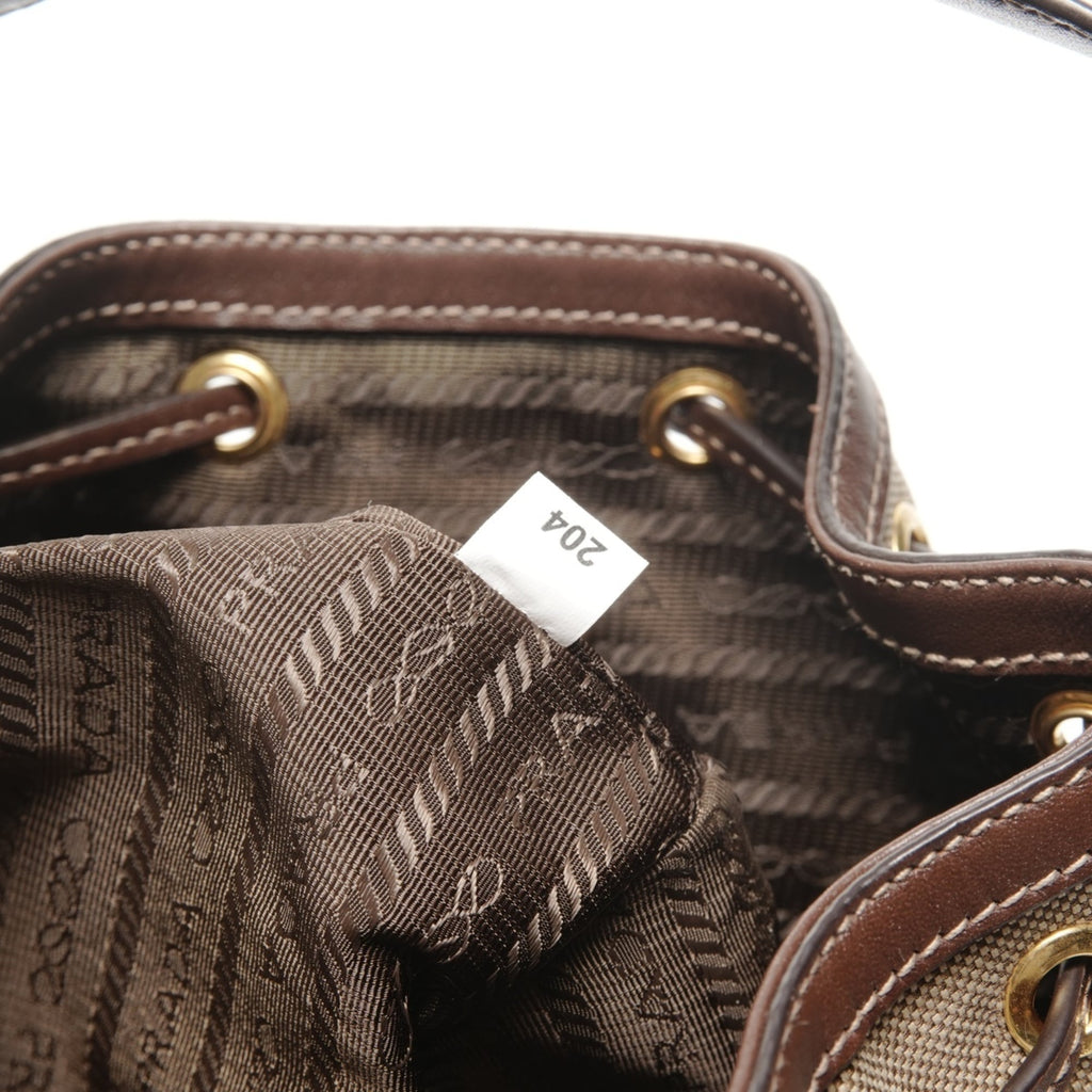 Prada Jacquard Logo Drawstring Shoulder Bag in Beige