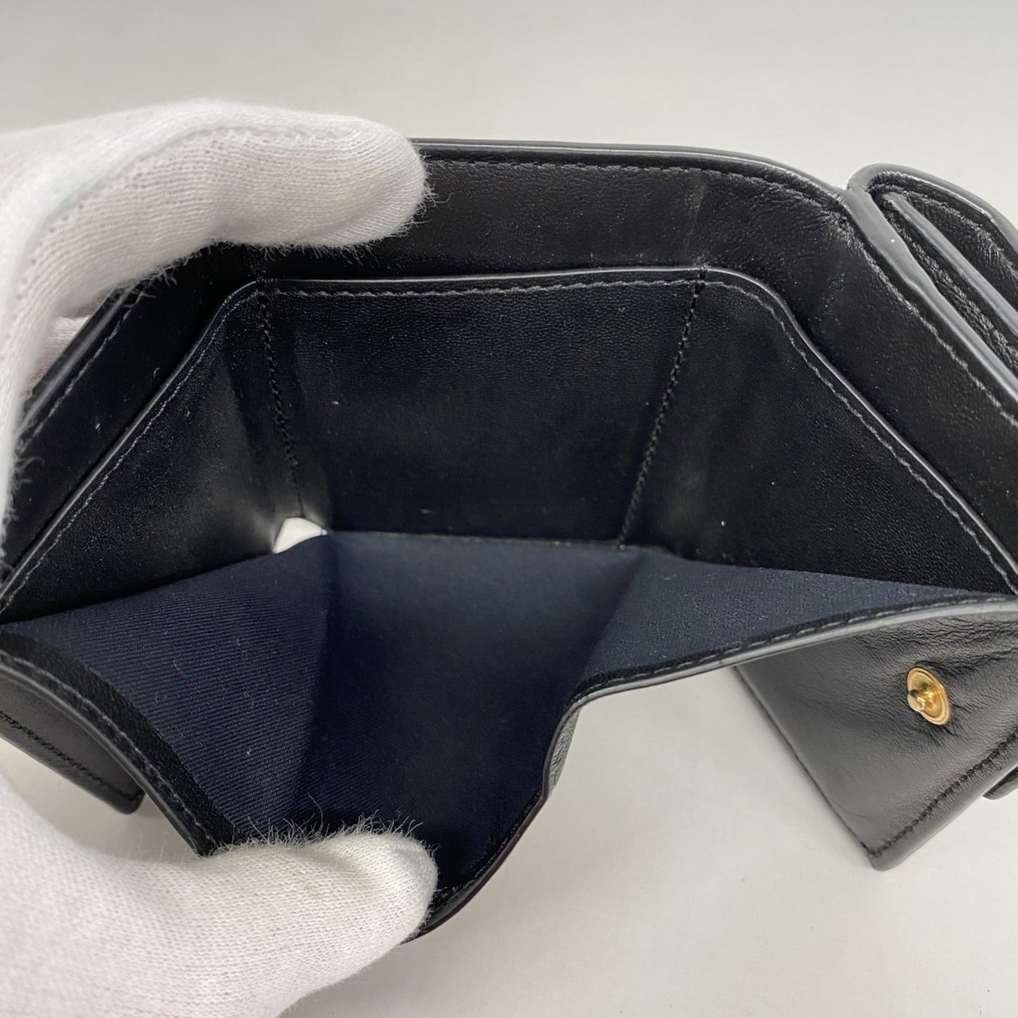 Fendi tri-fold wallet in black leather for women