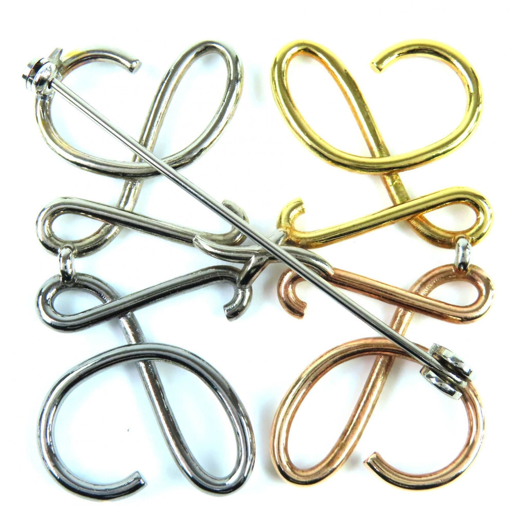 LOEWE Anagram Brooch in 4 Colors: Gold, Silver, Bronze. Comes with dust bag. Highly popular and recommended for women — Like New